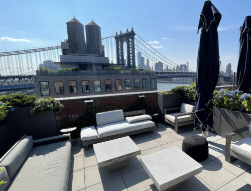DUMBO 10 Jay Street Rooftop showcasing the Brooklyn Bridge and a view of Manhattan