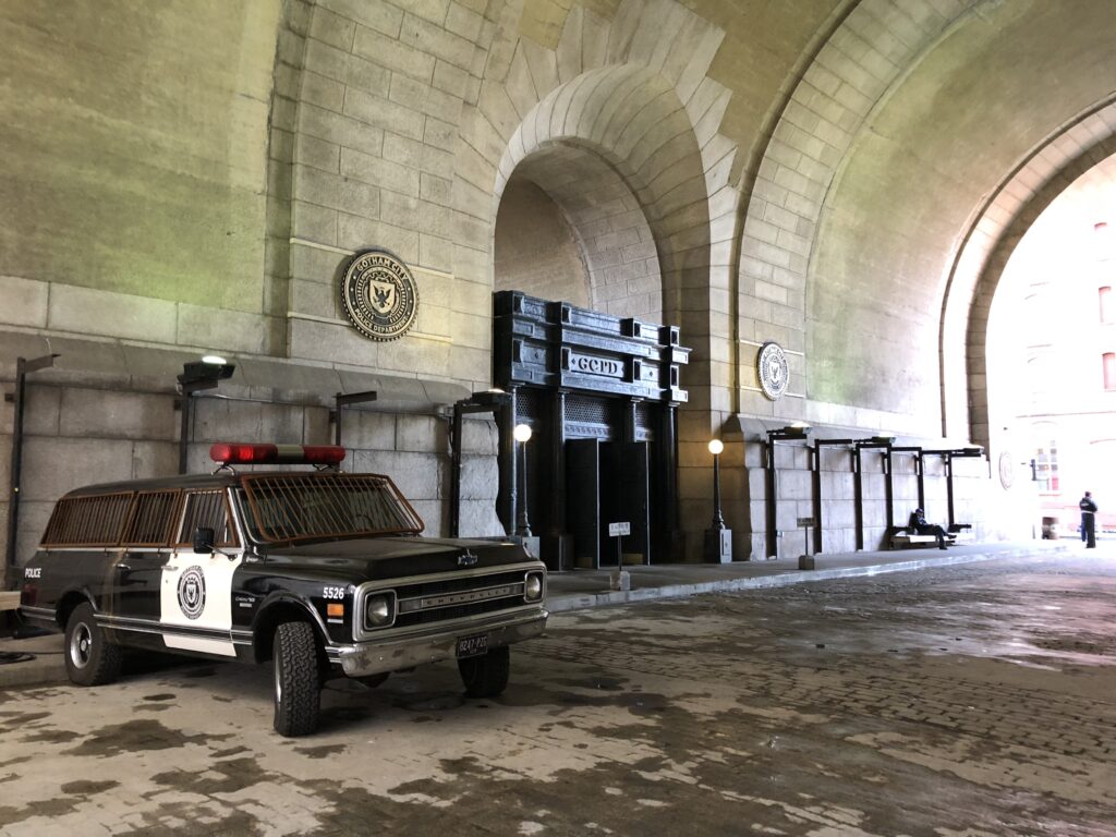 Gotham TV show police precinct photo shoot with a cop car