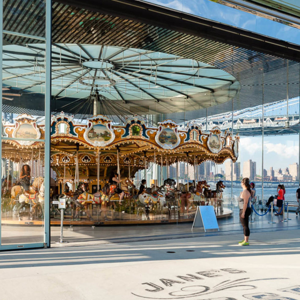 DUMBO Jane's Carousel next to the water with the view of Manhattan